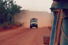 4WD driving off road on a dusty track with a GPS
